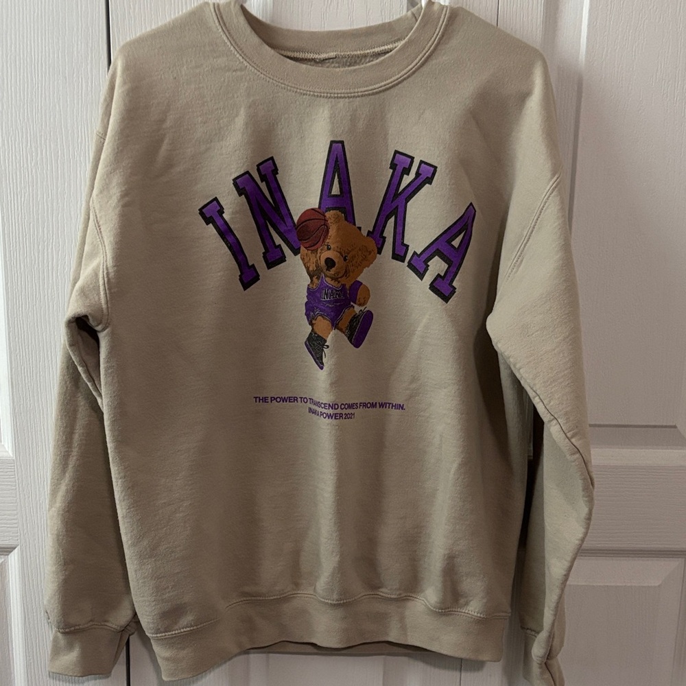 Inaka Power Beige Crewneck with Purple Bear Graphic.unisex